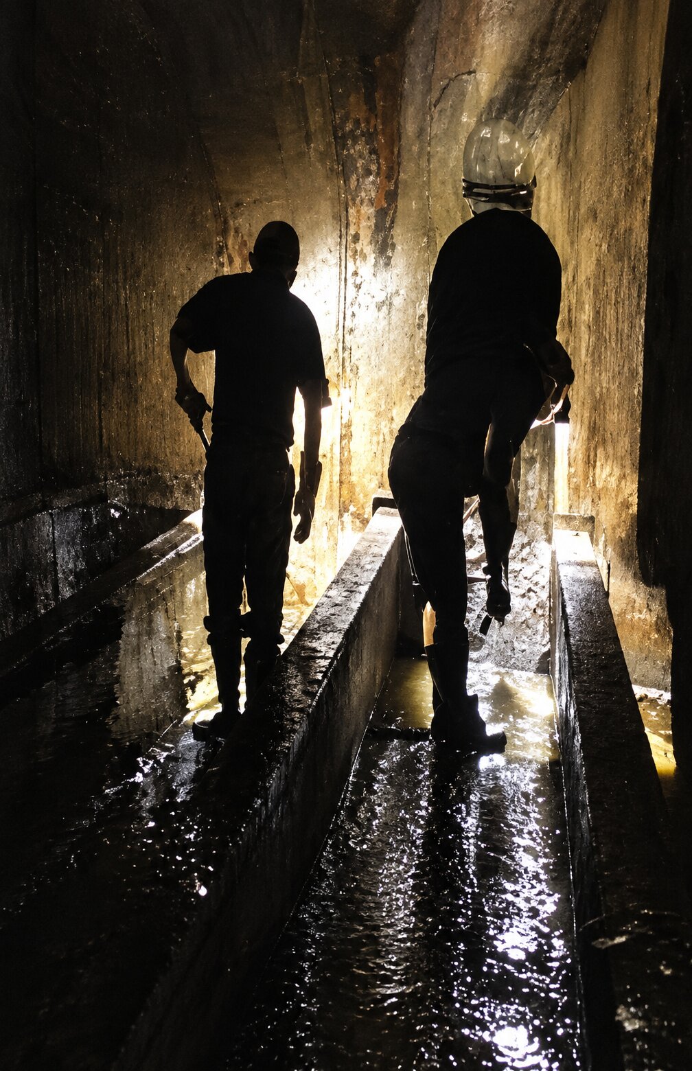 Crew cleaning the interior of a water ballast tank